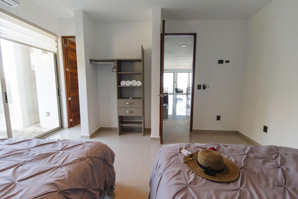 Angelina 28 Beachfront And Family Apartments - Modern And Relaxing Long Stays - 20 Min From Cancun Airport Puerto Morelos Eksteriør bilde